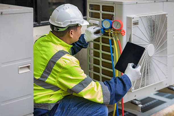 Professional Heat Pump Repair technician working in Squires, MO